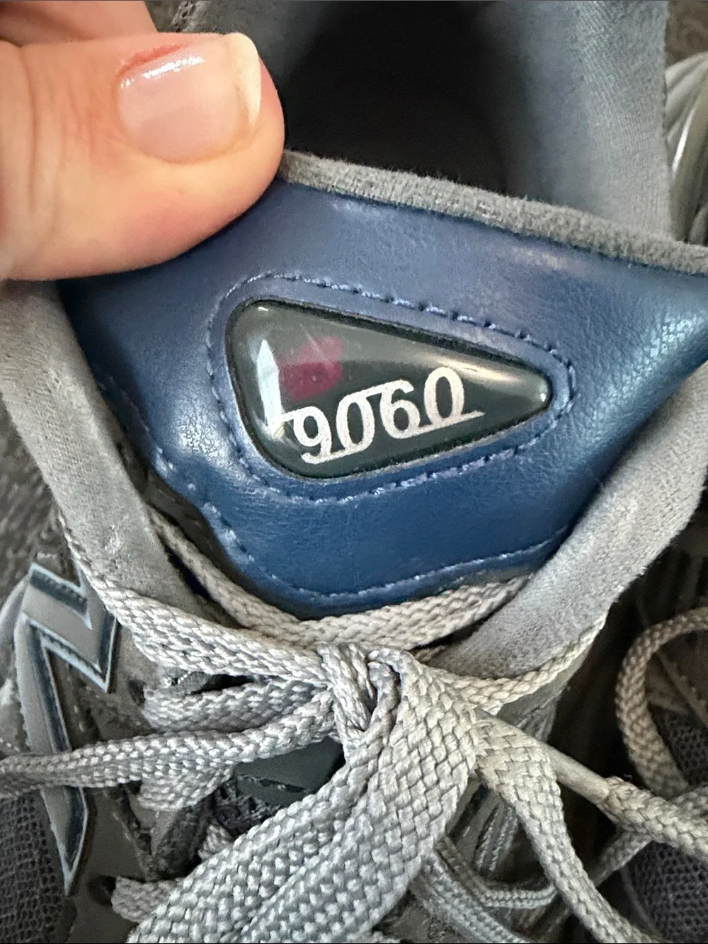 New Balance 9060 Gray Sneakers with Blue Logo Accents